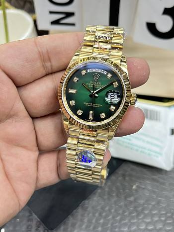 Rolex Day-Date 36 mm watch green ombré diamond dial
