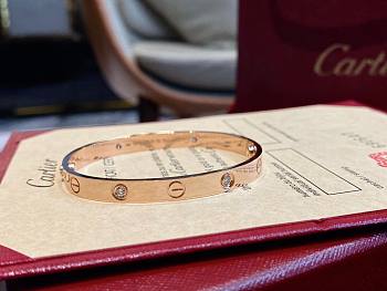 Cartier wide bracelet with 4 diamonds