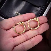 Celine's new gold knotted earrings - 5