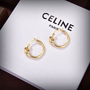 Celine's new gold knotted earrings - 4