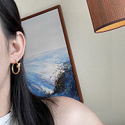 Celine's new gold knotted earrings - 3