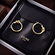 Celine's new gold knotted earrings - 2